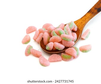 Gummy rings shaped cutter, isolated in wooden spoon on white background