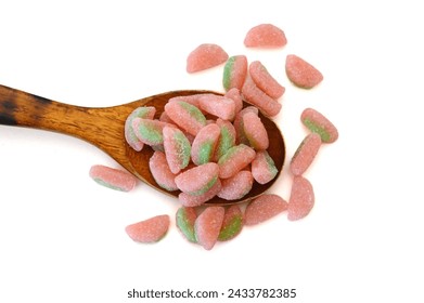 Gummy rings shaped cutter, isolated in wooden spoon on white background