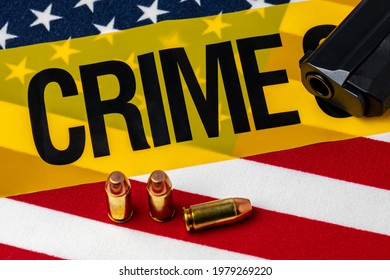 Gun, ammunition, crime scene tape and American flag. Concept of illegal firearm sales, crime and gun violence.