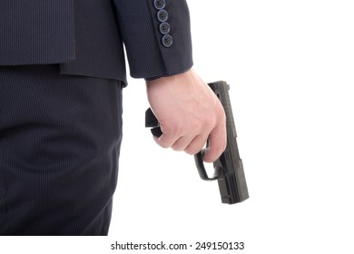 Gun In Business Man Hand Isolated On White Background