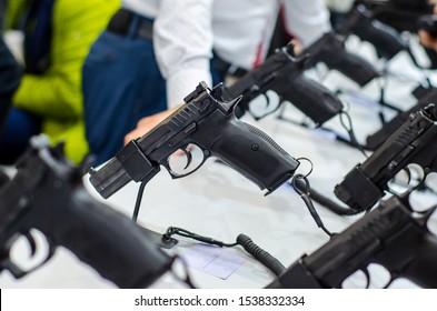 Gun Display Stands. Pistols For Sale In The Store.