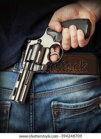 Gun in hand