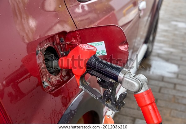 the gun is
inserted into the gas tank of the
car