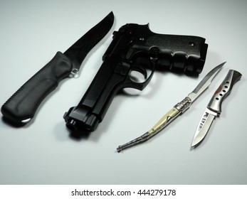       Gun and knife    