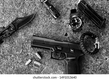 Gun, Knife, Tactical Watch And Other Survival Tools