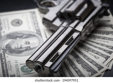 Gun And Money Concept