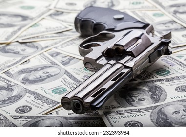 Gun And Money Concept