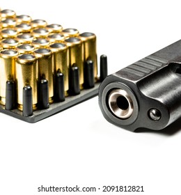 Gun Parts Of Automatic Hand Gun With 9 Mm Bullets On A White Background. Weapons