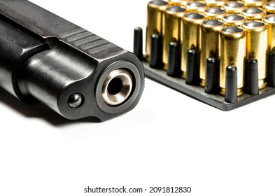 Gun Parts Of Automatic Hand Gun With 9 Mm Bullets On A White Background. Weapons