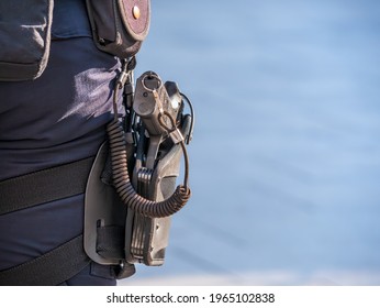 The Gun Or Pistol Of A Romanian Police Officer In Holster. Close Up.