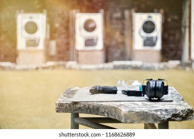 Gun, Projectile, On The Table In The Shooting Range