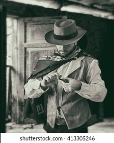 Gunfighter of the wild west while scrolling tobacco.