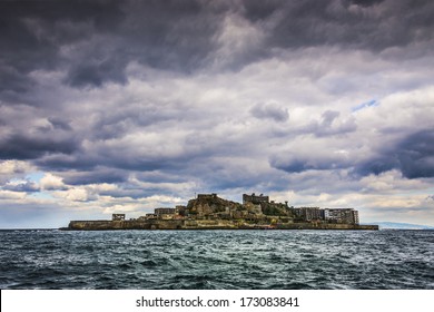 Gunkanjima, Japan is an abandoned coal mining island town off the Coast of Nagasaki in Kyushu Prefecture. - Powered by Shutterstock