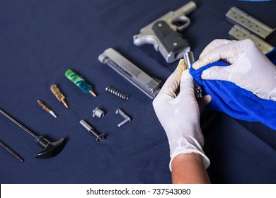 Gunsmith cleaning gun pistol assemble dismantle maintenance