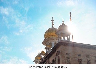 Gurdwara Sis Ganj Sahib With Blue Sky And Sun Light