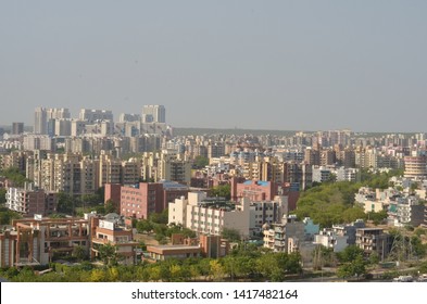 Gurgaon, India, 2019. Arial View Cityscape In Gurgaon, Noida, Jaipur, Delhi NCR, Lucknow, Mumbai, Bangalore, Hyderabad Showing Small Houses Sky Scrapers Other Commercial Real Estate Infrastructure