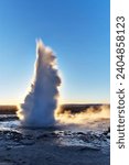 The gushing geyser Stokkur early in the winter morning in Iceland