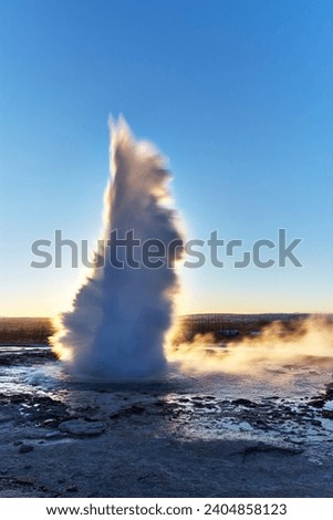 The gushing geyser Stokkur early in the winter morning in Iceland's golden triangle winter