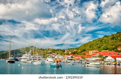 Gustavia, St.barts - November 25, 2015: Boats In Yacht Club Or Port In Tropical Harbor. Yachting And Sailing. Luxury Travel On Yacht. Water Transport And Vessel. Summer Vacation On Island.