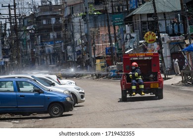 Guwahati, Assam, India. 1 March 2020. A Fire Fighter Spray Disinfectant, During Nationwide Lockdown In The Wake Of Coronavirus Pandemic, In Guwahati.