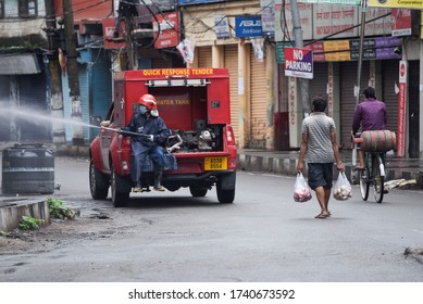 Guwahati, Assam, India. 25 May 2020. A Fire Fighter Spray Disinfectant At Fancy Bazar Area, During The Ongoing COVID-19 Nationwide Lockdown, In Guwahati.