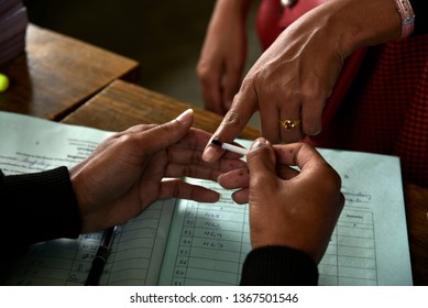 Guwahati, Assam, India. April 12, 2019. A Women Gets Her Finger Inked Before Casting His Vote At A Polling Station.