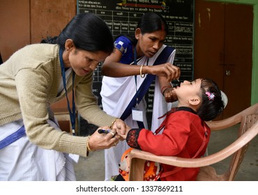 Guwahati, Assam, India. March 10, 2019. An Indian Child Receives Polio Vaccine Drops On National Immunisation Day In Guwahati.