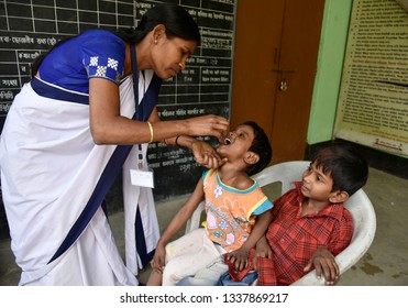 Guwahati, Assam, India. March 10, 2019. An Indian Child Receives Polio Vaccine Drops On National Immunisation Day In Guwahati.