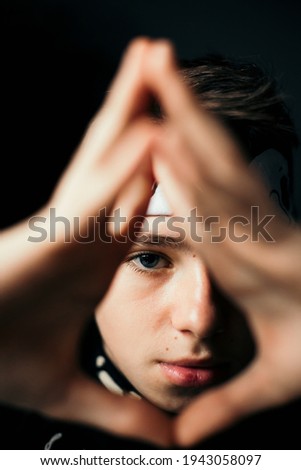 Similar – Image, Stock Photo mystical portrait of a young man: female hands on his face