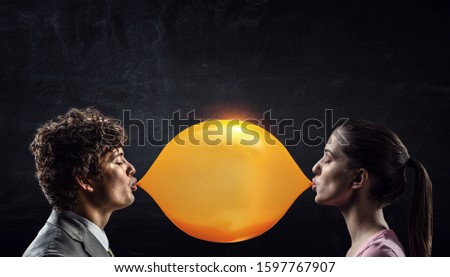 Guy blowing bubble . Mixed media