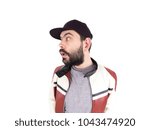 Guy with cap and jacket making funny expressions
