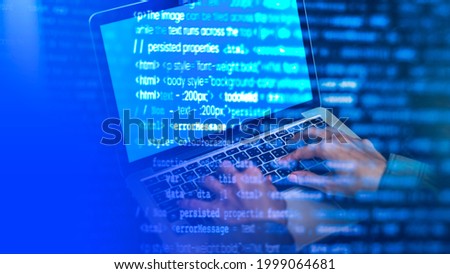 It guy coding on a laptop screen