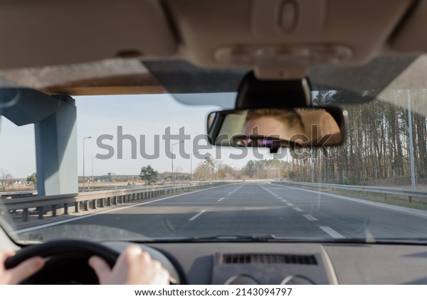 guy driving a car .Young man driving a car,\
interior shot . driving