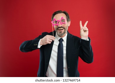 Guy Enjoying Party Carnival. Holiday Party Celebration. Having Fun. Office Party Corporate. Join Carnival. Man Formal Suit Wear Fake Glasses Accessory. Cheerful Businessman In Party Photo Booth Props.