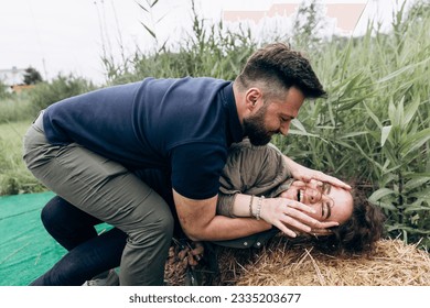 Guy and girl fooling around in nature