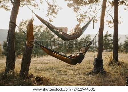 Similar – Foto Bild Young woman relaxing in a hammok