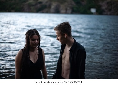 Guys are filming some girls on the beach