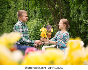 The Guy Gives The Girl Flowers 