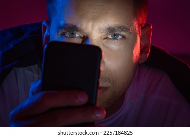 The guy got a security alert on his phone. Alarm button. Danger. Security Warning. Apartment invasion - Shutterstock ID 2257184825