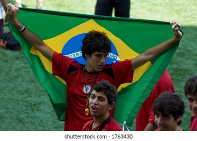 guy hold brazilian flag