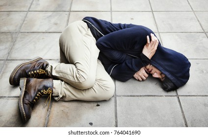 Guy In A Hoodie Fetal Position On The Floor