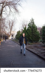 the guy of a jacket it is sure walks on the park late fall