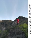 Guy looking at mountain