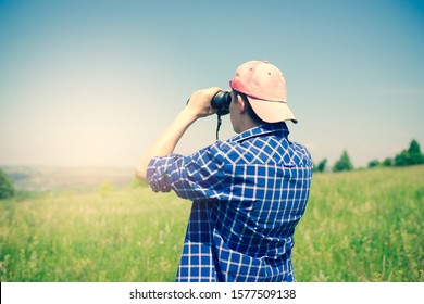 Guy Looking Through Binoculars 18-25 Years