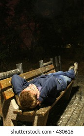 Guy lying on bench