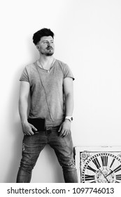 
guy with a notebook on a white background, black and white emotional portrait