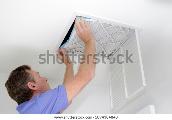 Guy Placing Into Square Ceiling Intake Stock Photo Edit Now