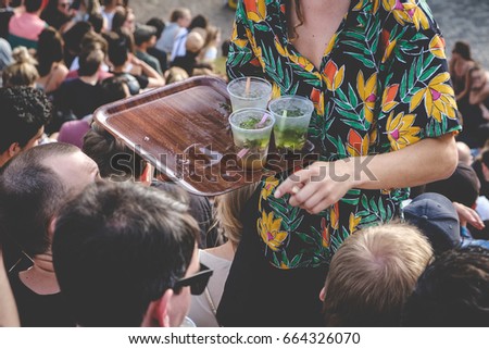 Similar – Mann öffnet Bierflasche am Sommergrill