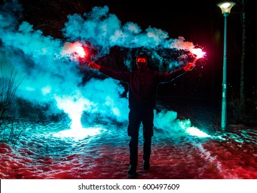 Guy with a signal rocket in his hands. Revolution in Ukraine. Anniversary of Euro-Maidan. Ultras is a football fan. - Shutterstock ID 600497609