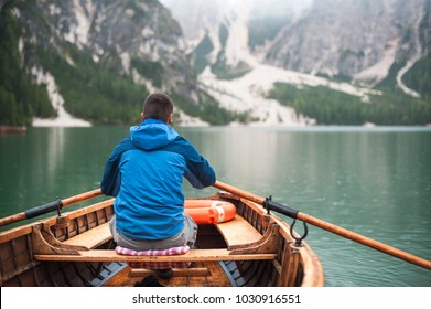 Guy Sitting Boat Starts Row Against Stock Photo (Edit Now) 1030916551